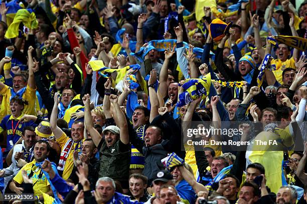 Ukraine fans celebrate after their opening goal during the FIFA 2014 World Cup qualifier group H match between England and Ukraine at Wembley Stadium...