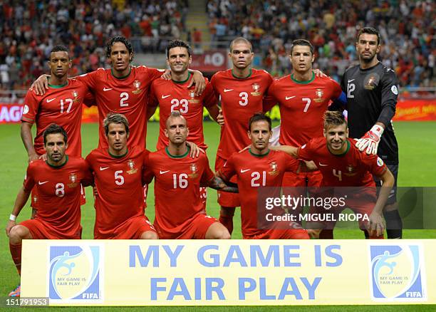 Portugal's squad poses before the FIFA World Cup 2014 qualifying football match between Portugal and Azerbaijan at the AXA Stadium in Braga, northern...
