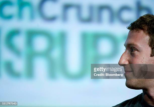 Mark Zuckerberg, chief executive officer and founder of Facebook Inc., listens during TechCrunch Disrupt SF 2012 in San Francisco, California, U.S.,...