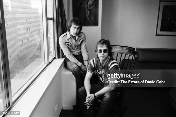 Lyricist Bernie Taupin and singer songwriter Elton John pose for a portrait in November, 1970 in New York City, New York.
