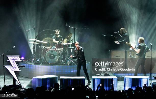 Ronnie Vannucci Jr., Brandon Flowers, Dave Keuning and Mark Stourmer of The Killers performs on stage during iTunes Festival at The Roundhouse on...
