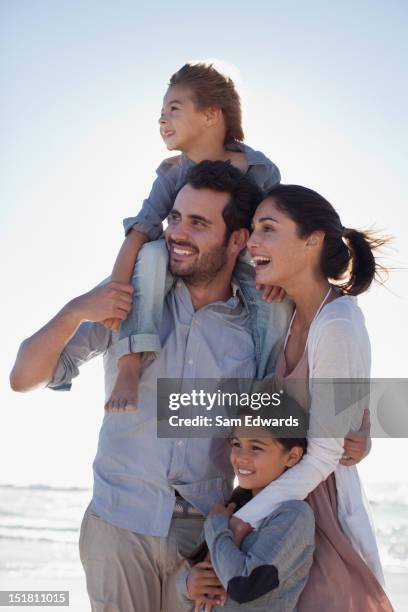 Smiling Family On Beach, Foto de stock