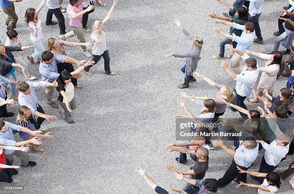 Crowd with arms outstretched