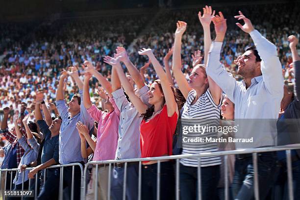 cheering crowd in stadium - cheering crowd in grandstand bildbanksfoton och bilder