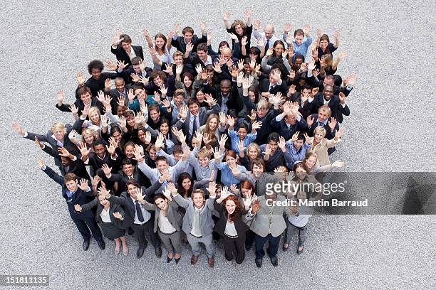 portrait of waving business people - large group of people stock pictures, royalty-free photos & images