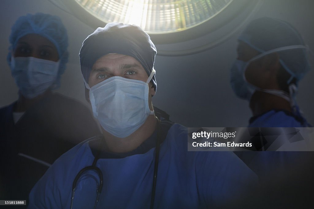 Portrait of confident surgeons in operating room
