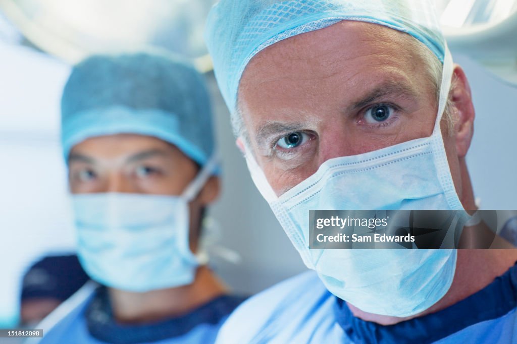 Close up portrait of serious surgeons