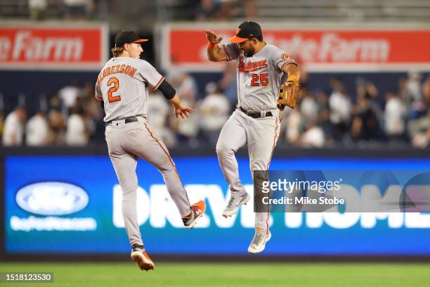 Gunnar Henderson and Anthony Santander of the Baltimore Orioles celebrate after defeating the New York Yankees 6-3 at Yankee Stadium on July 5, 2023...