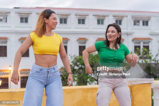 female group dancing hip hop on the street. - amigos baile bildbanksfoton och bilder