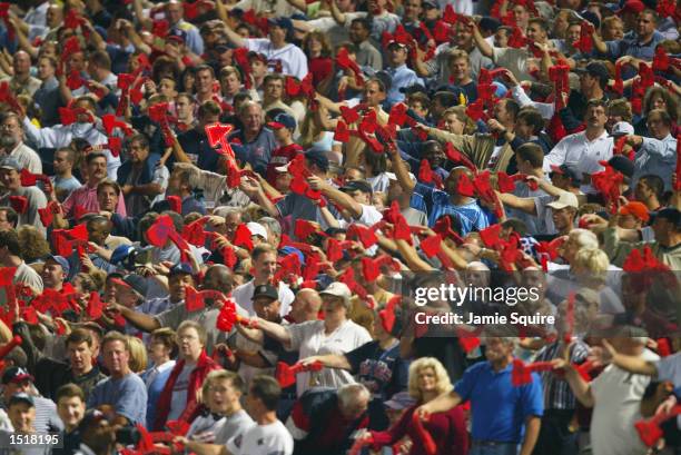 Fans of the Atlanta Braves do the tomahawk chop during game five of the National League Division Series against the San Francisco Giants on October...