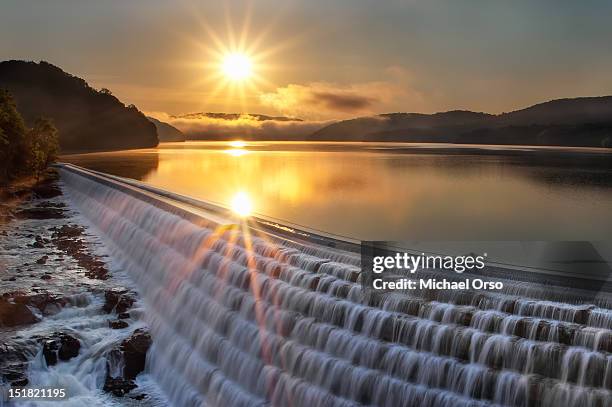 new croton dam at sunrise - hydroelectric power stock pictures, royalty-free photos & images