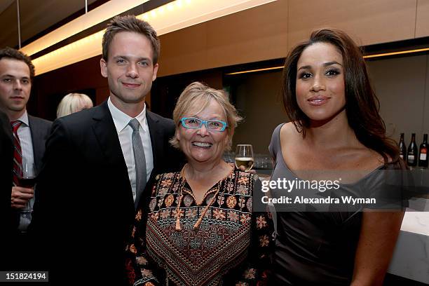 Actor Patrick J. Adams, FINCA Canada Board Member Jacquie Green, and actress Meghan Markle attend the FINCA Canada Fundraiser At TIFF 2012 during the...