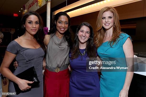 Actresses Meghan Markle, Gina Torres, guest, and Sarah Rafferty attend the FINCA Canada Fundraiser At TIFF 2012 during the Toronto International Film...