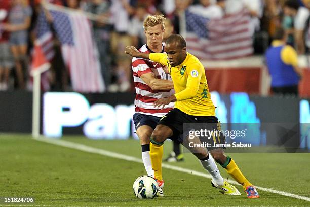 Brek Shea of the U.S. National Team defends against Dane Richards of the Jamaican National Team in the second half on September 11, 2012 at Crew...