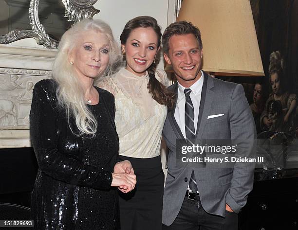 Singer Judy Collins, actress Laura Osnes and Nathan Johnson poses for photos at the Cafe Carlyle on September 11, 2012 in New York City.