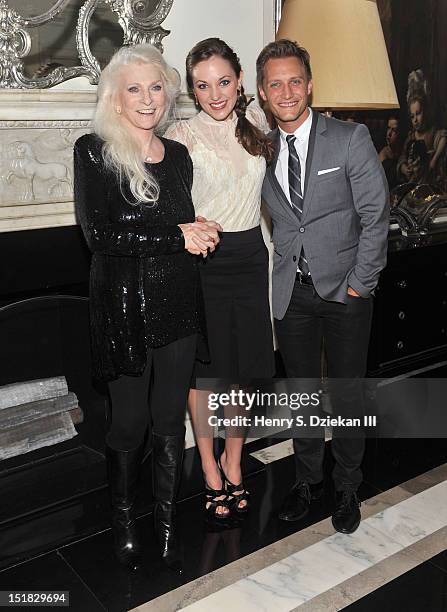 Singer Judy Collins, actress Laura Osnes and Nathan Johnson poses for photos at the Cafe Carlyle on September 11, 2012 in New York City.