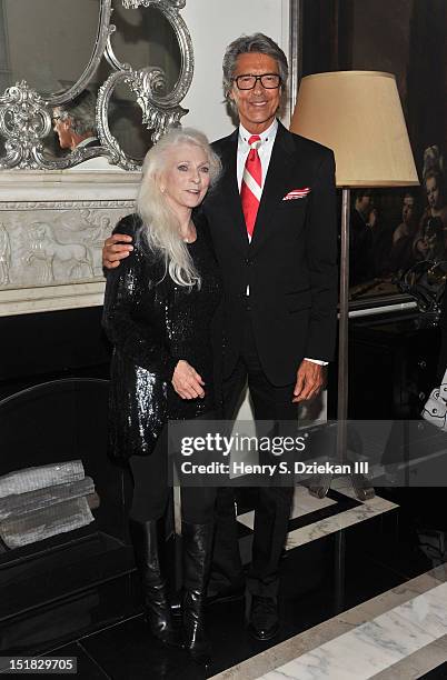 Singer Judy Collins and Tommy Tune pose for photos at the Cafe Carlyle on September 11, 2012 in New York City.