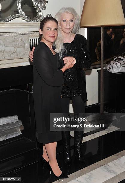 Actress Tovah Feldshuh and singer Judy Collins pose for photos at the Cafe Carlyle on September 11, 2012 in New York City.