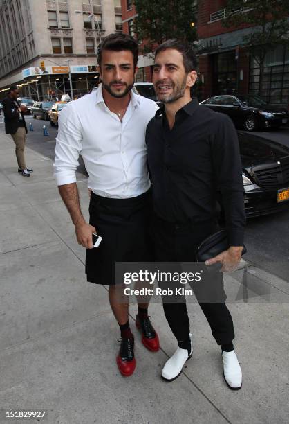 Designer Marc Jacobs and boyfriend Harry Louis arrive for the Marc for Marc Jacobs show on September 11, 2012 in New York City.