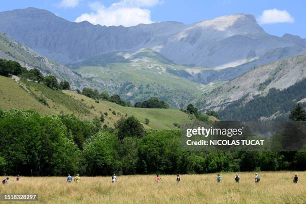 Volunteers take part in a search operation for two-and-a-half-year-old Emile who is reported missing for two days, on July 10, 2023 in the French...