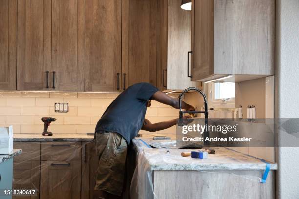 backsplash tile installation - masonry tools stock pictures, royalty-free photos & images