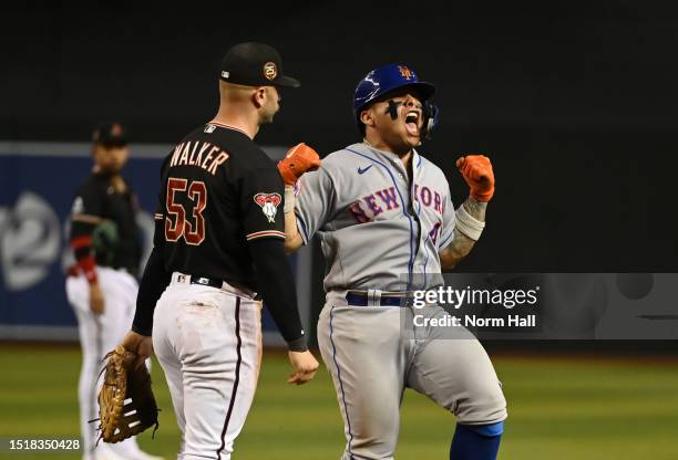 Francisco Alvarez of the New York Mets reacts after hitting a solo home run against the Arizona Diamondbacks during the ninth inning at Chase Field...