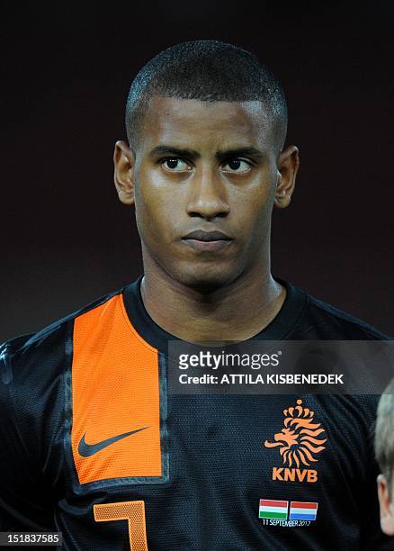 Netherland's Luciano Narsingh listens to the national anthem on September 11, 2012 at Puskas stadium in Budapest before a World Cup 2014 qualifying...