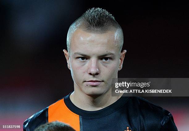 Netherland's Jordy Clasie listens to the national anthem on September 11, 2012 at Puskas stadium in Budapest before a World Cup 2014 qualifying...