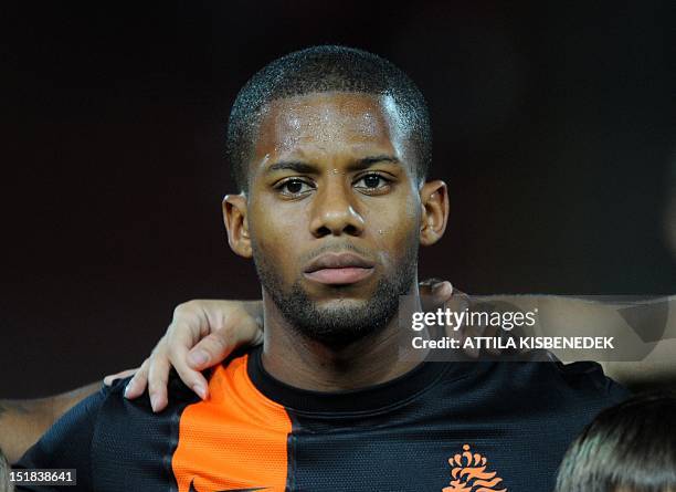 Netherland's Jeremain Lens listens to the national anthem on September 11, 2012 at Puskas stadium in Budapest before a World Cup 2014 qualifying...