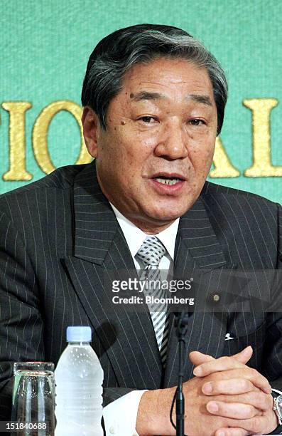 Hirotaka Akamatsu, Japan's former agriculture, forestry and fisheries minister, speaks during a debate with other candidates for leader of the...