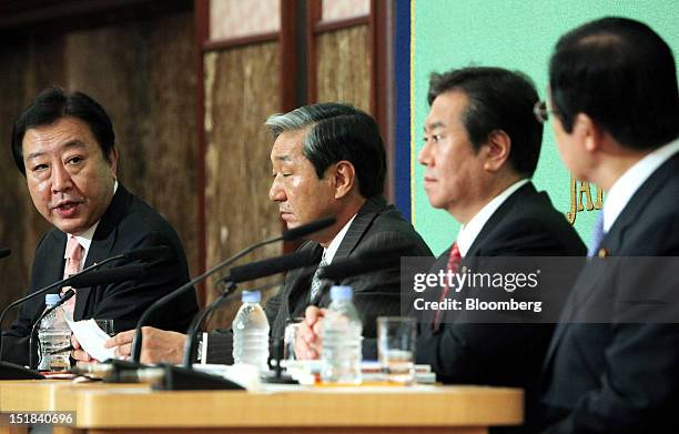 Candidates for leader of the Democratic Party of Japan attend a debate at the Japan National Press Club in Tokyo, Japan, on Thursday, Sept. 12, 2012....