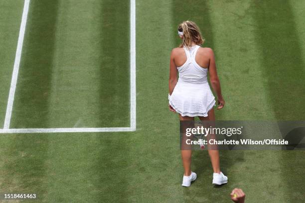 Mirra Andreeva throws her racket to the ground during her Ladies Singles round of 16 match against Madison Keys during day eight of The Championships...