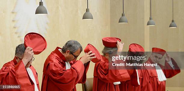 The President of the German Constitutional Court Andreas Vosskuhle and the other Judges of Germany's Constitutional Court arrive to give their...