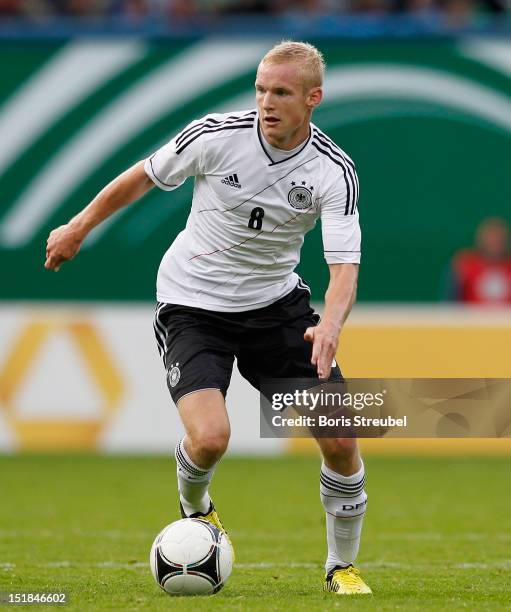 Sebastian Rode of Germany runs with the ball during the Under 21-Euro qualifier match between Germany U21 and Belarus U21 at DKB Arena on September...