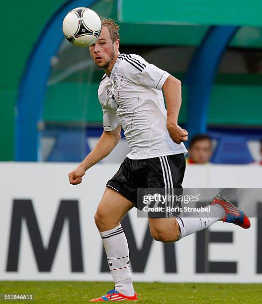 Maximilian Beister of Germany runs with the ball during the Under 21-Euro qualifier match between Germany U21 and Belarus U21 at DKB Arena on...