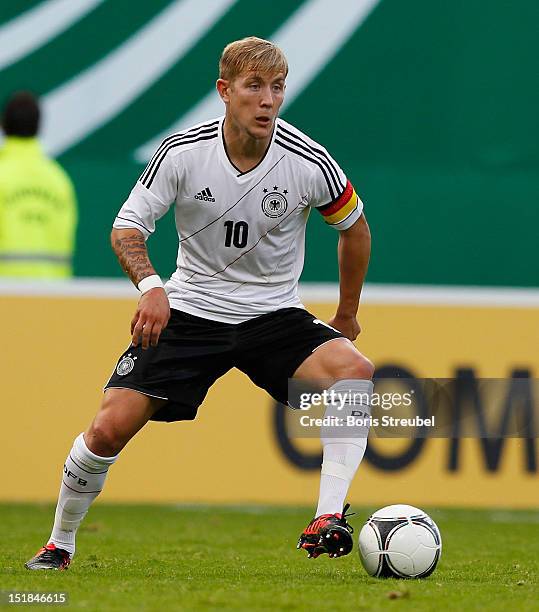 Lewis Holtby of Germany runs with the ball during the Under 21-Euro qualifier match between Germany U21 and Belarus U21 at DKB Arena on September 7,...