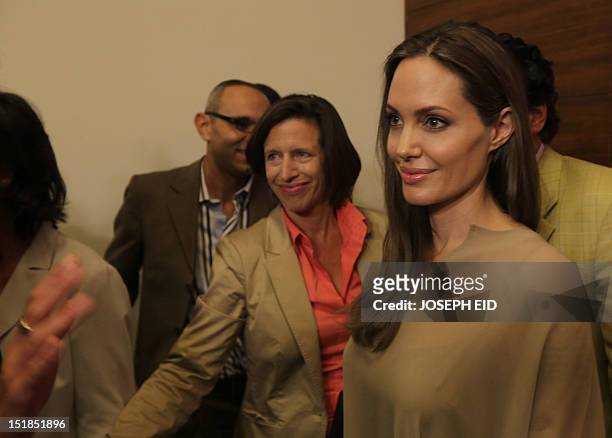 Actress and UNHCR special envoy Angelina Jolie attends a press conference with UN High Commissioner for Refugees Antonio Guterres in the Lebanese...