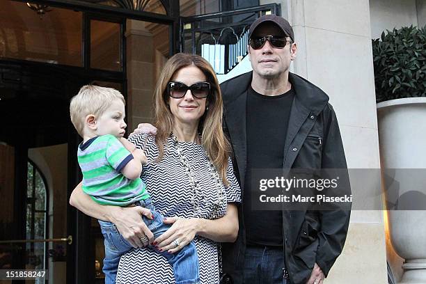 Actor John Travolta, his wife Kelly Preston and their son Benjamin are seen at the 'Four Seasons George V' hotel on September 12, 2012 in Paris,...