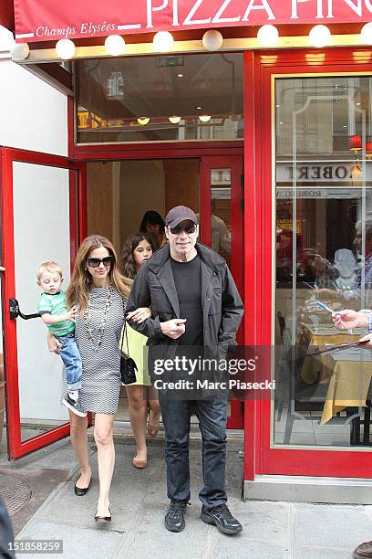 Actor John Travolta, his wife Kelly Preston, their son Benjamin and their daughter Ella Bleue are seen leaving the 'Pizza Pino' restaurant on...