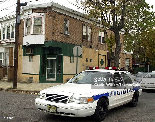Camden police cruiser passes 1400 Sheridan St. Where sniper suspect John Allen Muhammad had his blue Chevy Caprice that he was in when arrested in a...