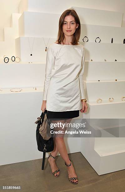 Jennifer Pastore attends the Monique Pean K'Atun Collection spring 2013 presentation during Mercedes-Benz Fashion Week on September 12, 2012 in New...