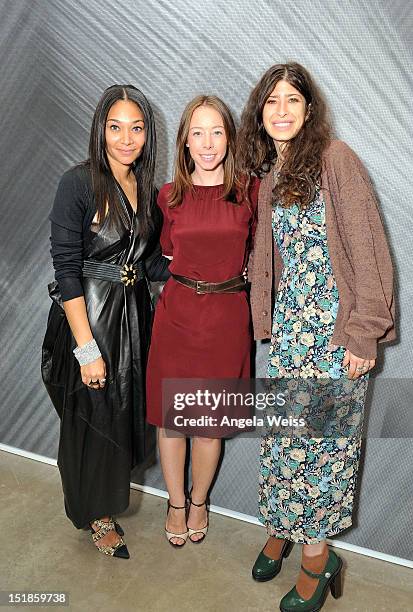 Monique Pean, Rickie Desole and Pamela Love attend the Monique Pean K'Atun Collection spring 2013 presentation during Mercedes-Benz Fashion Week on...