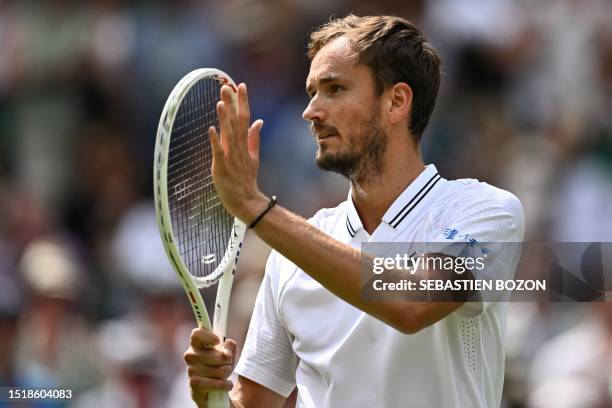 Russia's Daniil Medvedev celebrates winning against Czech Repbulic's Jiri Vesely after his withdrawal form their men's singles tennis match on the...