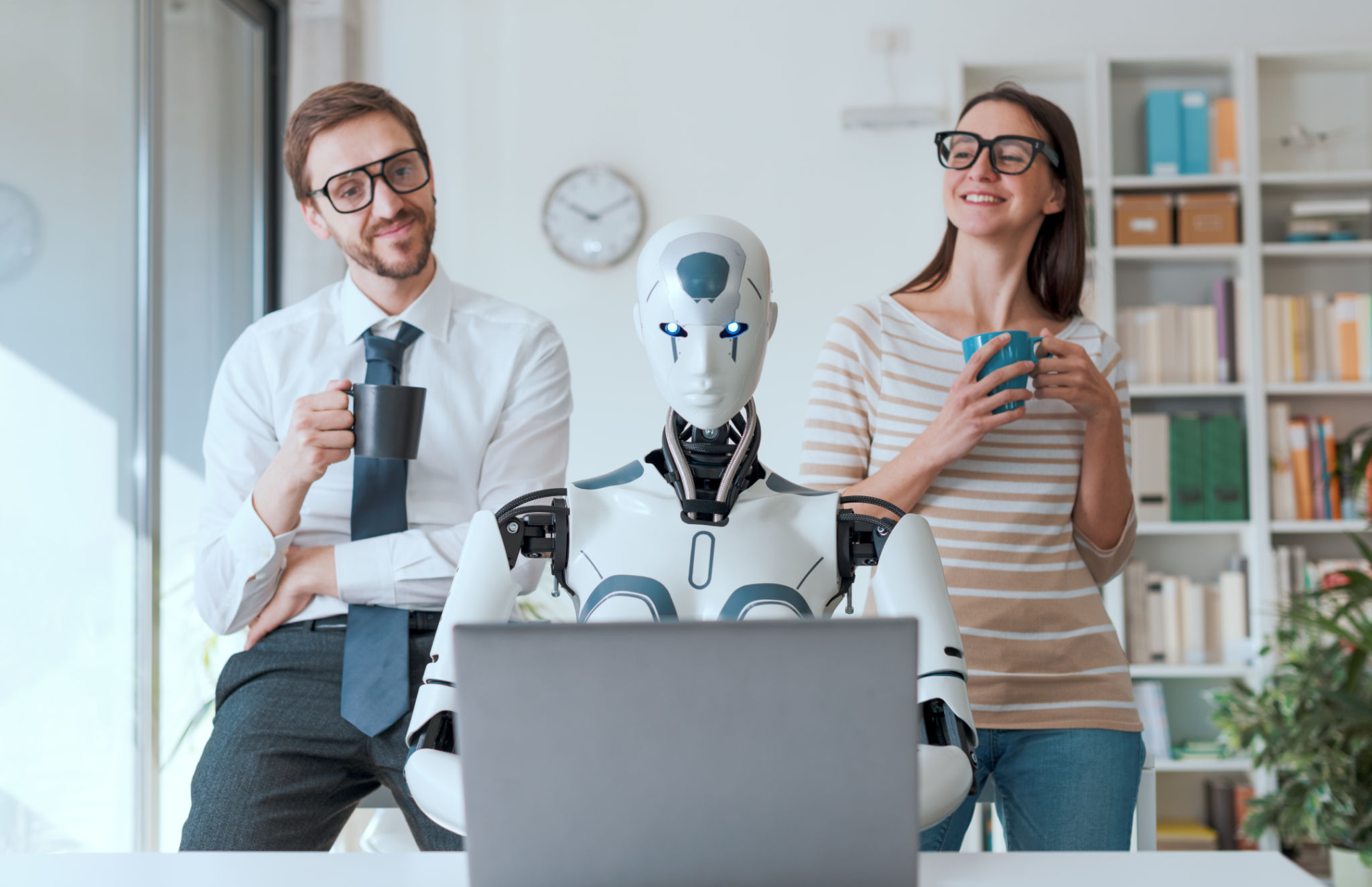 Business people supervising a robot work Business people supervising a robot work