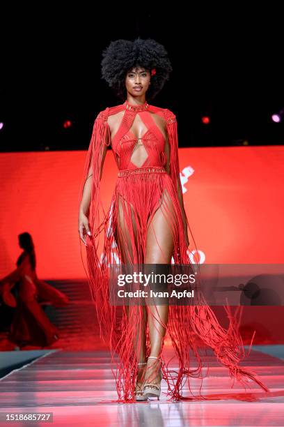 Model walks the Amarotto Swimwear Show's runway during the Miami Swim Week's Kick Off Runways Shows at SLS South Beach on July 05, 2023 in Miami...