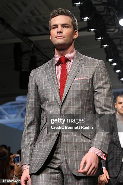 Personality Ryan Serhant walks the runway wearing Richard Smith of the Best Of British Menswear during Nolcha Fashion Week Spring / Summer 2013 at...