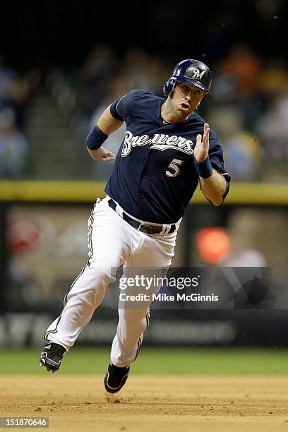 Taylor Green of the Milwaukee Brewers runs to third base during the game against the Atlanta Braves at Miller Park on September 11, 2012 in...