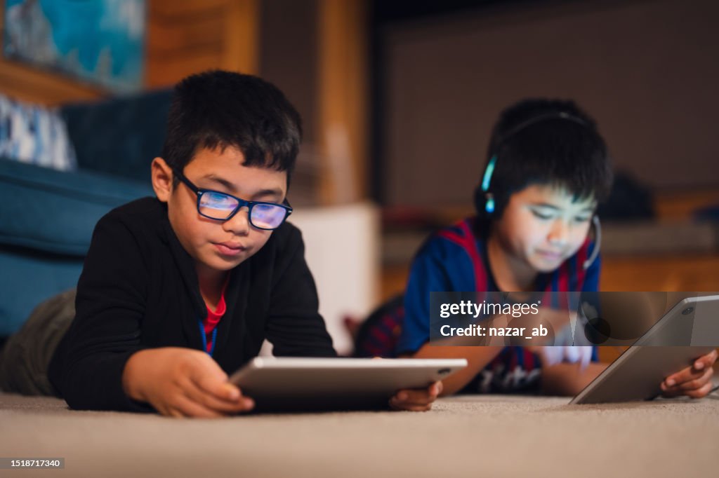 Kids busy on their devices.
