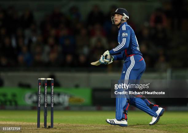 Jos Buttler of England flips a shot for four during the 3rd NatWest International T20 between England and South Africa at Edgbaston on September 12,...
