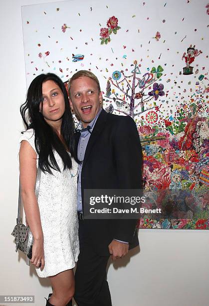 Anna Abramovich and Jamie Wood attend as SCREAM launch their new Eastcastle Street gallery with a private view of artist Ye Hongxing's inaugural solo...